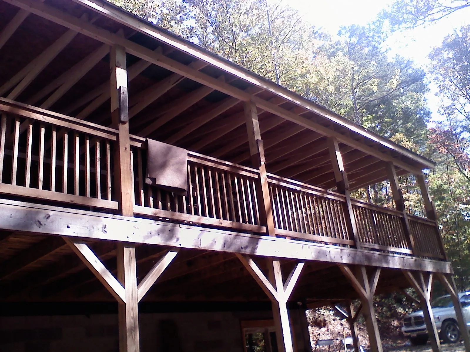 Timber framing under a new elevated porch and deck — Roof Leak Repair in Kent City by Roofing Brothers